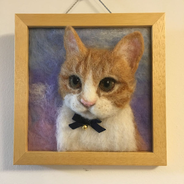 A wool felt photo frame: the perfect pet memorial gift